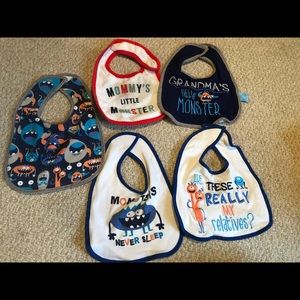5 monster themed bibs